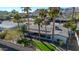 Home with palm trees and fresh green yard, offering great curb appeal at 9821 N 29Th Pl, Phoenix, AZ 85028
