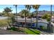 Home with palm trees and green yard for curb appeal and charm at 9821 N 29Th Pl, Phoenix, AZ 85028