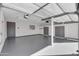 Clean, organized garage with epoxy floor at 9821 N 29Th Pl, Phoenix, AZ 85028