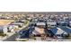 A picturesque aerial view of a planned community featuring modern homes and desert landscaping at 10309 E Supernova Dr, Mesa, AZ 85212