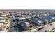 Expansive aerial view of a well-maintained suburban neighborhood with modern homes and desert landscaping at 10309 E Supernova Dr, Mesa, AZ 85212