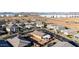 Aerial view showcasing a well-planned community with modern homes and desert surroundings at 10309 E Supernova Dr, Mesa, AZ 85212