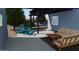 Stylish outdoor living with a covered patio, comfortable seating, and a glimpse of the refreshing pool, a perfect retreat at 10309 E Supernova Dr, Mesa, AZ 85212