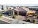 Attractive single-story home boasts well-maintained landscaping, a brick driveway, and inviting curb appeal at 10309 E Supernova Dr, Mesa, AZ 85212