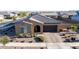 Charming single-story home with a well-manicured front yard, complemented by a brick driveway and appealing curb appeal at 10309 E Supernova Dr, Mesa, AZ 85212