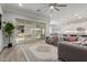 Spacious living room with large sliding glass doors to the outdoor living area at 10309 E Supernova Dr, Mesa, AZ 85212