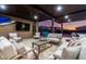 An inviting outdoor living space boasts comfortable seating and a view of the vibrant sunset at 10309 E Supernova Dr, Mesa, AZ 85212