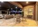 Outdoor space with dining and lounging areas, ideal for enjoying meals or relaxing outside at 10309 E Supernova Dr, Mesa, AZ 85212