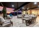 Covered patio offering cozy seating and a view of the backyard, great for outdoor relaxation at 10309 E Supernova Dr, Mesa, AZ 85212