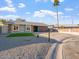 Charming single story home with low maintenance desert landscaping and a private drive at 10619 W Sells Dr, Phoenix, AZ 85037