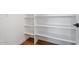 Pantry with convenient shelving for organized storage, and vinyl floors at 10619 W Sells Dr, Phoenix, AZ 85037