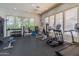 Bright and airy fitness center with modern exercise equipment and large windows at 15221 N Clubgate Dr # 1138, Scottsdale, AZ 85254