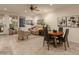 Inviting open concept living room and dining area with comfortable seating and plenty of light at 15221 N Clubgate Dr # 1138, Scottsdale, AZ 85254