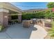 Well-maintained outdoor grilling area, perfect for entertaining with built-in grills and counter space at 15221 N Clubgate Dr # 1138, Scottsdale, AZ 85254