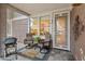 Outdoor patio area with tile flooring, seating, and a grill, perfect for entertaining or relaxing at 15221 N Clubgate Dr # 1138, Scottsdale, AZ 85254