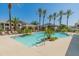 Inviting community pool area surrounded by lush landscaping and comfortable lounge chairs at 15221 N Clubgate Dr # 1138, Scottsdale, AZ 85254