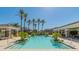 Beautifully landscaped community pool with ample seating areas for residents and guests at 15221 N Clubgate Dr # 1138, Scottsdale, AZ 85254