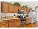 Functional kitchen with tile countertops and modern appliances at 1619 E Beretta Pl, Chandler, AZ 85286