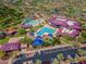 Wonderful aerial view of the waterpark with pools, slides, parking, and well-maintained grounds at 1635 W Owens Way, Anthem, AZ 85086