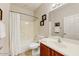 Full bathroom featuring a shower-tub combo, single sink vanity, and ample lighting at 1635 W Owens Way, Anthem, AZ 85086