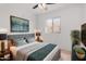 Comfortable bedroom featuring a cozy bed, ample natural light, and minimalist decor at 16848 W Bradford Way, Surprise, AZ 85374