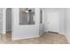 Bright entryway features tile flooring, neutral paint, and an arched niche at 16848 W Bradford Way, Surprise, AZ 85374