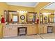 Bathroom featuring double sinks and a large mirror and storage at 17675 N Coconino Dr, Surprise, AZ 85374