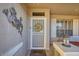 Welcoming front entrance with decorative wreath, security door, and sidelight windows at 17675 N Coconino Dr, Surprise, AZ 85374