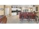 Bright kitchen area featuring ample counter seating, stainless appliances, and lots of light at 17675 N Coconino Dr, Surprise, AZ 85374