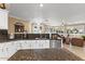 Bright kitchen boasts stainless appliances, granite countertops, and abundant cabinet space at 17675 N Coconino Dr, Surprise, AZ 85374