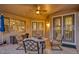 Inviting patio featuring comfortable seating and a ceiling fan, ideal for enjoying outdoor living and entertaining guests at 17675 N Coconino Dr, Surprise, AZ 85374