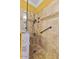 Shower with tiled walls and showerhead at 17675 N Coconino Dr, Surprise, AZ 85374