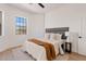 Bright bedroom featuring a comfortable bed, soft rug, and natural light, creating a serene and welcoming retreat at 18344 W Santa Irene Dr, Goodyear, AZ 85338