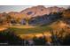 Scenic golf course with desert mountain views at 18344 W Santa Irene Dr, Goodyear, AZ 85338