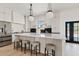 Modern kitchen featuring a large island, stainless steel appliances, and ample counter space at 18344 W Santa Irene Dr, Goodyear, AZ 85338