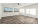 The bedroom has three windows that provide plenty of natural light at 22500 N Greenland Park Dr, Maricopa, AZ 85139