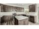 Well-equipped kitchen with a center island, stainless steel appliances, and ample counter space at 22500 N Greenland Park Dr, Maricopa, AZ 85139