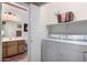 Functional laundry area, offering both a washer and dryer, and located adjacent to the bathroom at 2600 E Springfield Pl # 61, Chandler, AZ 85286