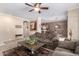 Open-concept living room with neutral tones, modern decor, and ample seating at 2600 E Springfield Pl # 61, Chandler, AZ 85286
