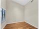 Cozy bedroom with hardwood floors, a neutral paint scheme, and a window with blinds at 2662 S Iowa St, Chandler, AZ 85286