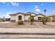 Charming single-story home with desert landscaping and stone accents on the facade at 2662 S Iowa St, Chandler, AZ 85286