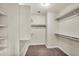 Spacious walk-in closet with built-in shelving and ample storage space at 2662 S Iowa St, Chandler, AZ 85286