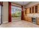 Bright breakfast nook with a chandelier and backyard views at 37267 Ne Greythorn Cir, Carefree, AZ 85377