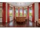 Elegant dining room featuring a chandelier and views of the backyard at 37267 Ne Greythorn Cir, Carefree, AZ 85377
