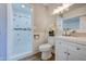 Updated bathroom with a walk-in shower, modern vanity, and stylish finishes at 3728 E Grove Ave, Mesa, AZ 85206
