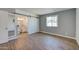 Bedroom features a large closet with a sliding barn door and natural light at 3728 E Grove Ave, Mesa, AZ 85206
