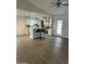Bright kitchen with white cabinets, stainless steel appliances, kitchen island, and wood floor at 3728 E Grove Ave, Mesa, AZ 85206