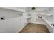 Well-organized walk-in pantry features custom shelves at 3728 E Grove Ave, Mesa, AZ 85206