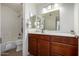 Bathroom featuring a vanity with drawers, a large mirror and modern lighting at 4354 N 82Nd St # 183, Scottsdale, AZ 85251