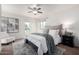 Spacious bedroom with a ceiling fan, carpeted floor and cozy decor at 4354 N 82Nd St # 183, Scottsdale, AZ 85251